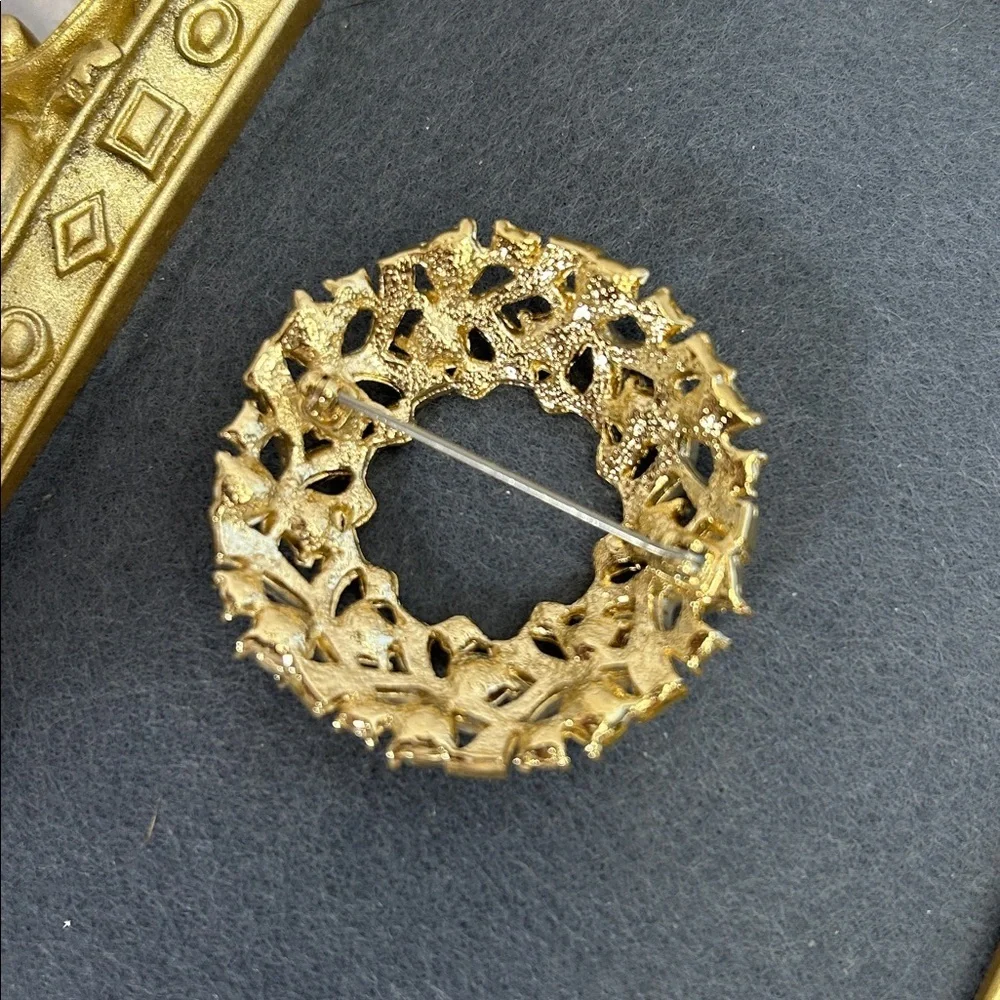 Elegant Gold and Jewel-Toned Brooch
